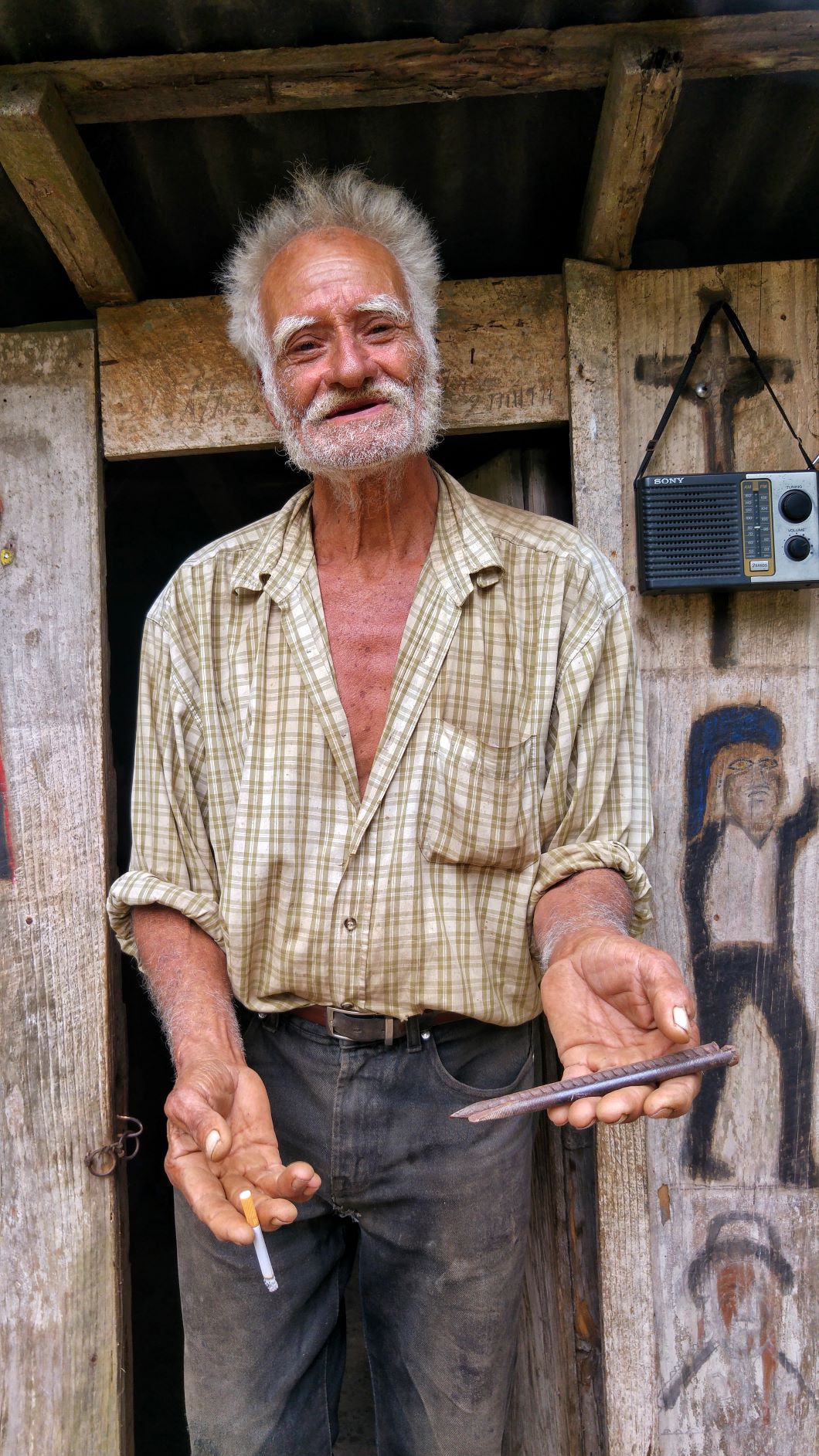 Alberto Gutierrez with rock carving tools