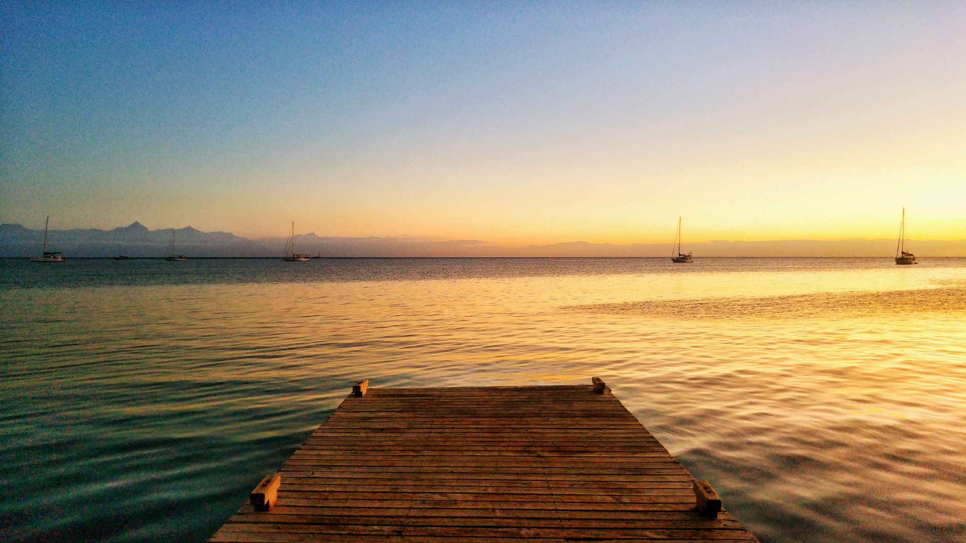 Sunset from boat dock in Utila