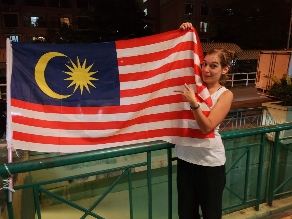 Holding a Malaysian Flag