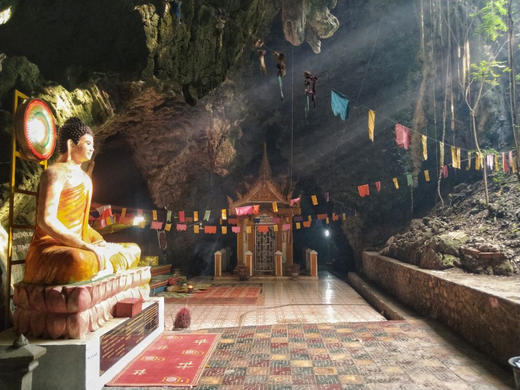 Buddha statue in a cave