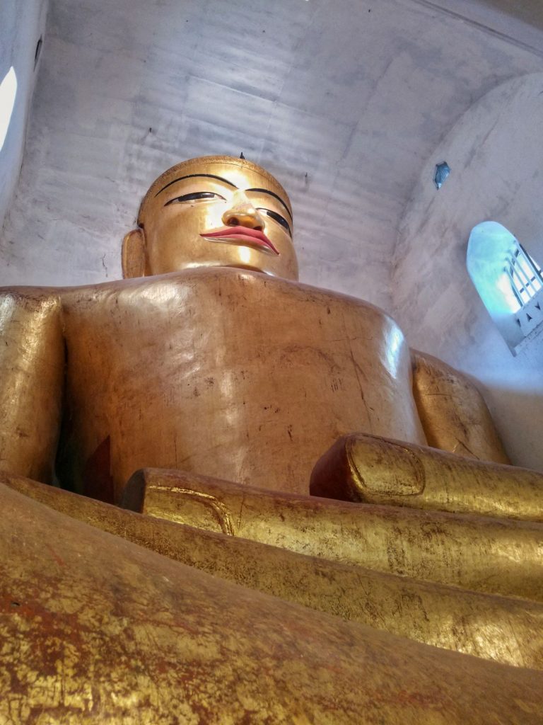 Large golden Buddha in a temple
