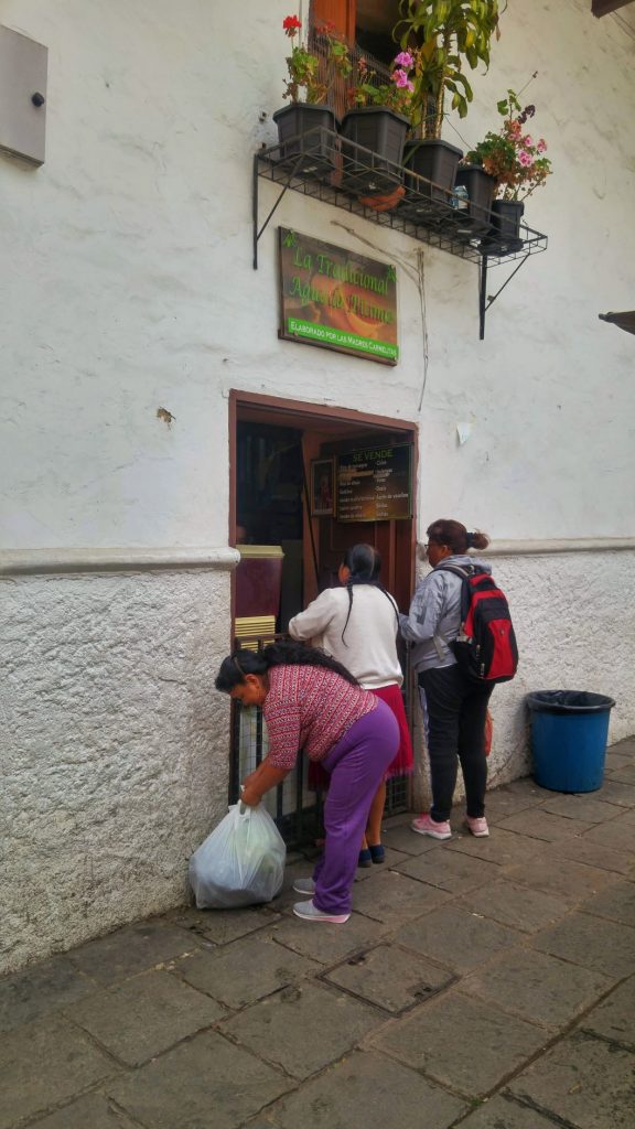 Ecuador people buying drinks